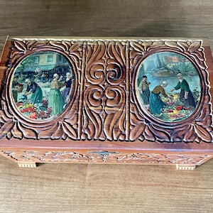 Carved Cedar Box, 2 Oval Paper Scenes, Hinged Top. Typical of these 1940's Boxes. Half of Clasp is Missing. There is no Mirror. See Details