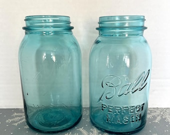 May include: Two vintage blue glass Ball Perfect Mason jars.