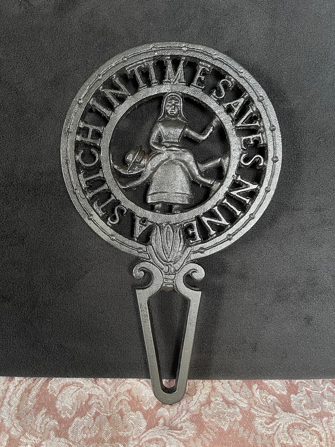 1950's60's WILTON Cast Iron Trivet, Novelty a Stitch in Time Saves