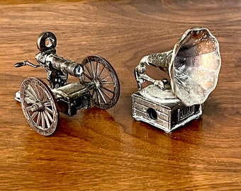 1960's Souvenir Kitschy Pencil Sharpeners, 1 Cannon, 1 Phonograph, Antiqued Brass Look, Good  VTG Condition, SOLD Seperately. Size in Photo