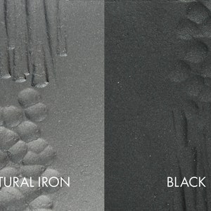 May include: Close-up of two metal samples, one labeled "NATURAL IRON" and the other "BLACK". The natural iron sample has a rough, textured surface, while the black sample has a smoother, more uniform surface.