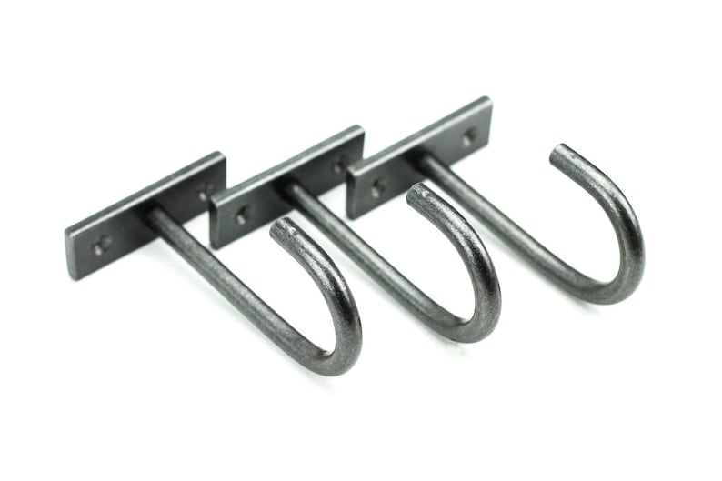 Simple hand forged rustic modern iron ceiling hooks, under cabinet style, on a white background.