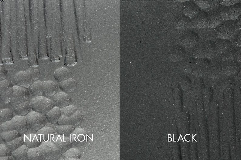 May include: Close-up of two metal surfaces, one with a natural iron finish and the other with a black finish. Both surfaces have a textured pattern.