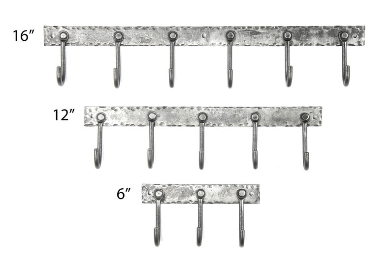 May include: Three sizes of hammered metal hooks with 6, 4, and 3 hooks. The hooks are 6 inches, 12 inches, and 16 inches long.