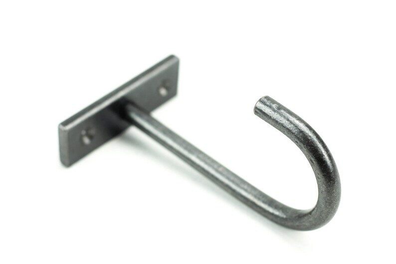 Simple blacksmith made rustic modern iron ceiling hook, undercabinet style, on a white background.