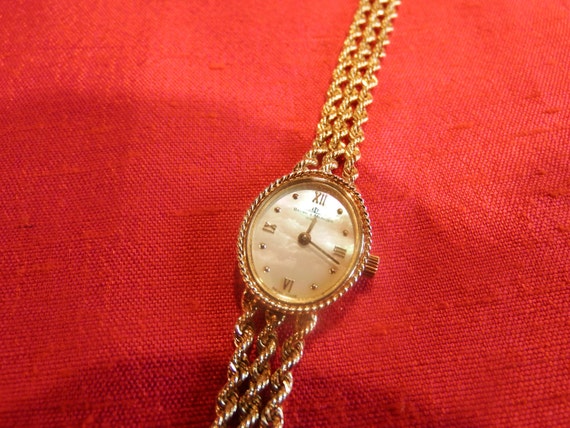 baume mercier women's 14k gold watch