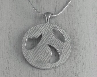 Fine Silver Pendant with cutouts