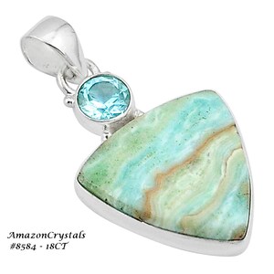 May include: A silver pendant featuring a triangular green and blue gemstone, with a smaller round blue gemstone. The pendant is set against a white background. #8584 - 18CT