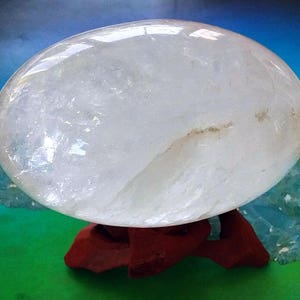 Quartz Crystal Shiva Lingam: Energy Balancing Stone with Teakwood Stand