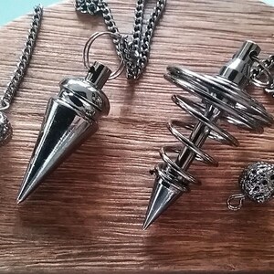 Sacred Geometry Dowsing Pendulum Set: Black Titanium Vortex Coil, Cone Point