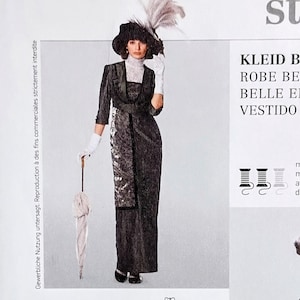 May include: A Burda Style sewing pattern featuring a Belle Epoque dress design. The cover includes a photo of the dress, illustrations, and size charts in US and European sizes. The text includes "KLEID BELLE EPOQUE" and "BELLE EPOQUE DRESS".