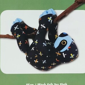 May include: A sewing pattern cover for a 18 inch soft toy sloth named Slowpoke the SLOTH by Funky Friends Factory. The cover features a black sloth with a colorful cross pattern hanging from a branch, with text including Soft toys you'll LOVE to make and make to LOVE!