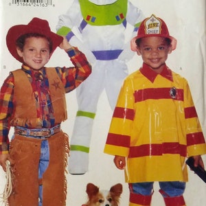 May include: Butterick 4654 sewing pattern envelope featuring three costume designs: a cowboy outfit with a plaid shirt, vest, and chaps; a space ranger suit with a hood; and a fire chief uniform with a yellow jacket and red helmet.
