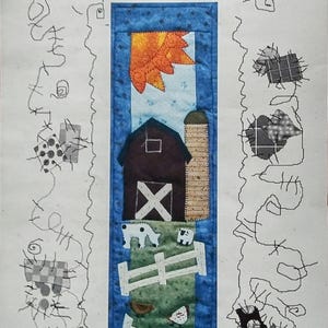 May include: A fabric art piece titled "Barnyard" by Patch Abilities, measuring 6 x 21 inches. The design features a barn, silo, fence, and farm animals. The top has an orange and yellow sun design.