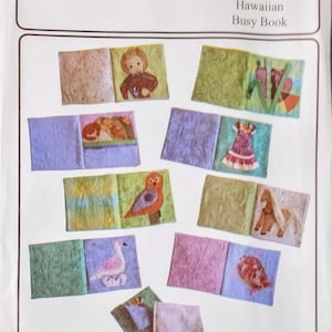 May include: A craft pattern for a Hawaiian Busy Book, featuring various fabric pages with illustrations. The cover reads "Victoria Jones Collection" and "404 Hawaiian Busy Book". The pages depict a doll, dress, owl, horse, and other images.