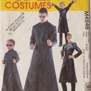 May include: McCall's Costumes pattern for a Matrix-themed costume. The pattern features illustrations of children wearing long, black coats and sunglasses. The pattern includes sizes for kids aged 3-8.