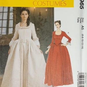 May include: McCall's Costumes pattern M7965. The pattern features two historical gowns, one in white and the other in red. The white gown has a square neckline and long sleeves. The red gown has a similar design. The pattern size is A5 (6-8-10-12-14).
