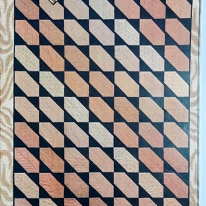May include: A quilt pattern titled "Crosswise" featuring a repeating geometric design of alternating light and dark peach-colored parallelograms on a black background. The design is framed by a decorative border and includes text.