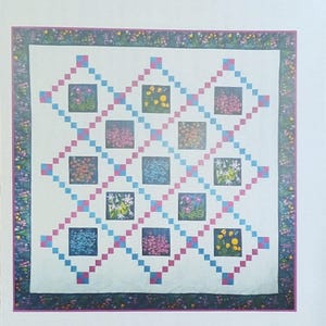 Wild Chains pattern for twin and queen size quilts from Lighthouse Quilts & Things #LHQ010 (2016)  K6453