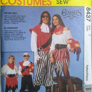 May include: McCall's Costumes pattern for pirate costumes. The image shows a man and woman in pirate attire, with a parrot prop. The pattern includes sizes for misses, men, boys, and girls. The text reads "Easy to Sew".