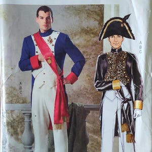 May include: A Butterick sewing pattern, BP190, featuring two historical costume designs. One design is a blue and white military-style jacket with red accents and a sash. The other is a black jacket with gold embellishments and a bicorne hat.