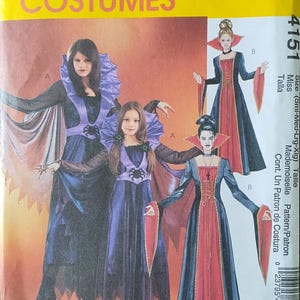 May include: A McCall's Costumes pattern envelope featuring illustrations of vampire costumes. The costumes are in shades of black, blue, and red, with dramatic collars and sleeves. The envelope has the text "McCall's Costumes" in large letters.