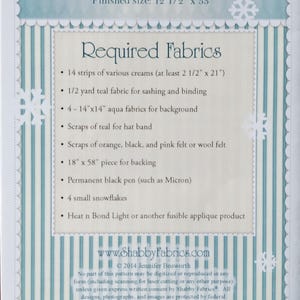 May include: A sewing pattern for a Patchwork Snowman Table Runner with a finished size of 12 1/2 inches by 53 inches. The document lists required fabrics including cream strips, teal fabric, aqua background fabric, felt scraps, and snowflakes.