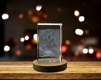 May include: A 3D laser engraved crystal cube with a detailed image of a warrior figure. The crystal cube is on a wooden base.