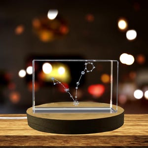 Regalo de cristal grabado en 3D con gráfico de estrellas de Tauro