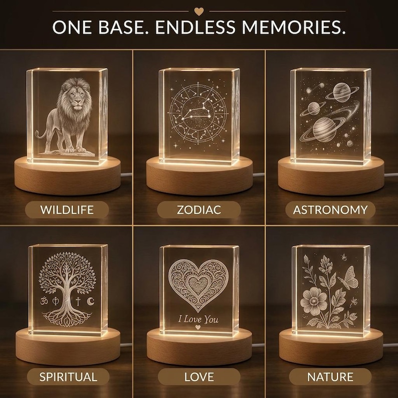 May include: A collection of illuminated crystal blocks with various etched designs, including a lion, zodiac symbols, planets, a tree, a heart with "I Love You," and flowers. Each block sits on a wooden base, with the text "ONE BASE. ENDLESS MEMORIES."