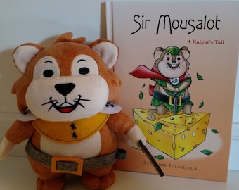 May include: A plush brown and yellow toy with a smiling face and a sword. The toy is next to a book titled "Sir Mousalot: A Knight's Tail".