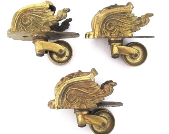 Antique ornate caster wheels. #8A4G7D0K2