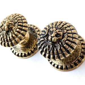 Lion door knobs. NOS Solid brass lion head door handles. Can be used as 2 separate bolted knobs or as a set of door handles. #9C6G7D0K3