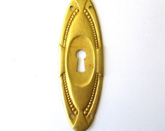 1 (ONE) Brass Stamped keyhole cover, furniture decoration. Hardware. #7DCG32K2