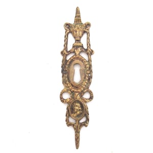 Antique brass escutcheon, keyhole cover, empire. #9C5G2BK1