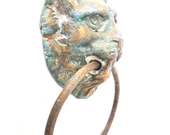 Antique Lion Head embellishment.