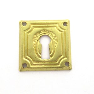1 (ONE) small Keyhole cover, escutcheon, key hole frame, plate. #7D7G1EK3