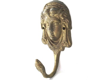 Antique brass ornate wall hook, 1 (one) coat hook, woman. #96AG47K1
