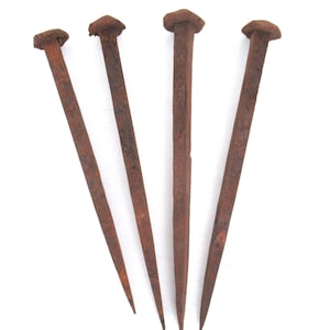 Set of 4 Large Rusty Hand Forged Iron Nails: Antique Restoration Hardware