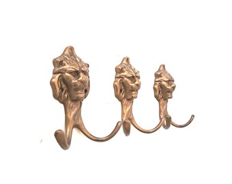 Set of 3 Brass Lion Head Coat hooks.