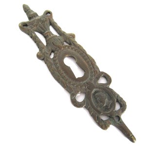 Antique brass escutcheon, keyhole cover, empire. #8A4G43K3