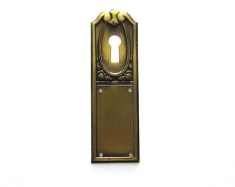 1 (ONE) Brass Stamped keyhole cover, furniture decoration. Hardware. #7D7G1EK3