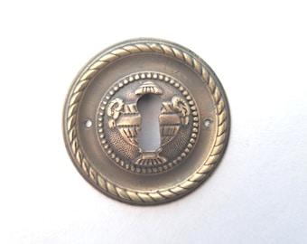 Antique escutcheon, keyhole cover - ram - empire.