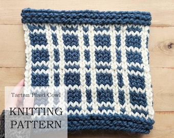 May include: Tartan Plaid Cowl Knitting Pattern by Lady Jay Crochet. A close-up of a knitted cowl with a blue and white plaid pattern.
