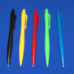 May include: Five stylus pens in different colors: black, yellow, red, green, and blue. The pens have a white tip and a textured grip.
