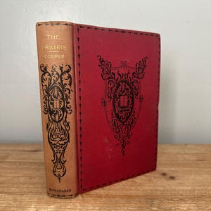 May include: A set of three ceramic mugs with a speckled, matte finish. Each mug features a different color: light blue, cream, and gray. The mugs have a simple, modern design and a comfortable handle. Perfect for coffee or tea.