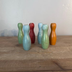 Vintage wooden painted toy bowling pins