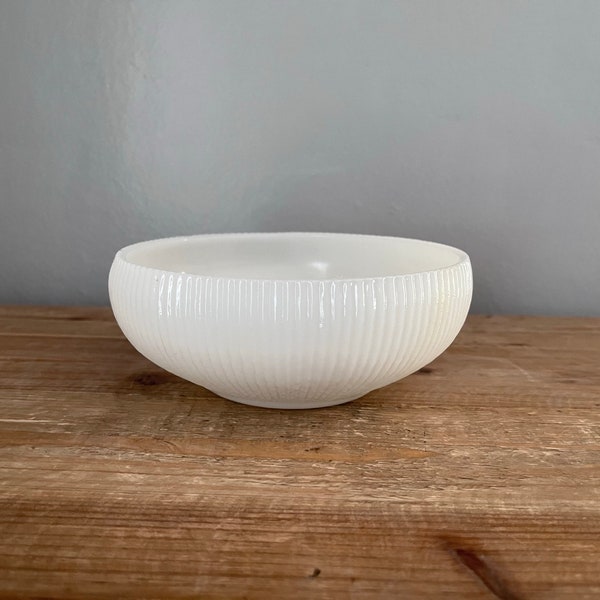 Milk glass ribbed bowl by E.O. Brody Co.