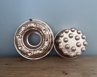 Set of 2 vintage copper toned decorative molds