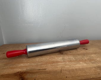 Vintage Krispy Krust chrome rolling pin with red handles